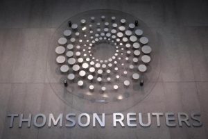 The Thomson Reuters logo inside lobby of company building in Times Square, New York