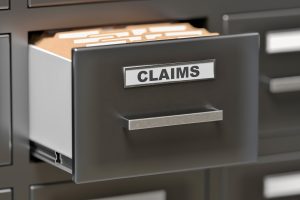 Claims files and documents in cabinet in office. 3D rendered illustration.