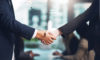 Regulated capital ‘super hot’ in asset management consolidation, says Ropes & Gray; Schroders signs $13.5bn sale to Nuveen Two men in suits shake hands - only their arms are visible