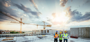 Image of construction workers on a site.