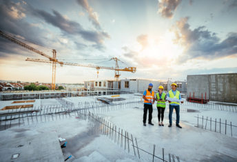 Image of construction workers on a site.