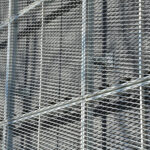 closeup of wire mesh netting outside building