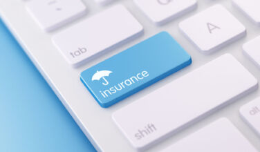 Image of an insurance key on a keyboard.