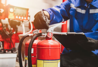 Engineer check fire suppression system,check fire extinguisher tank in the fire control room for safety. (Getty Image)