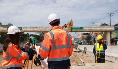 UK built environment pulls in private equity; Providence Equity featured in They Said It Construction engineer talking to architect at industrial construction site in road construction site (Getty)