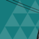 An electricity pylon with power lines, representing the power and transmission sectors.