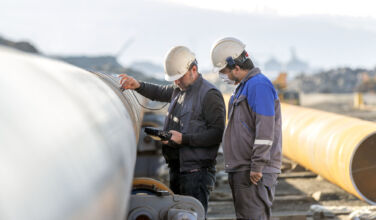 Non-destructive testing technicians are checking welds of pipe with ultrasonic testing (UT) method_Getty