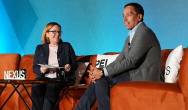 PEI Group's MK Flynn and Clearlake's José E. Feliciano on stage at NEXUS 2026