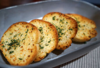 Close up Sliced garlic and butter bread toast