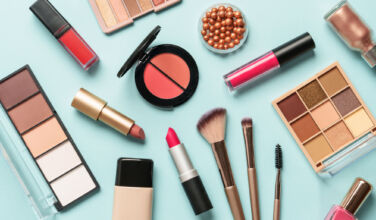 Beauty products on blue background.