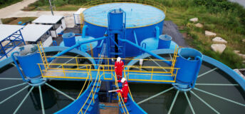 Water industrial workers in water treatment plant (Getty)