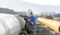 Technician ultrasonic pipeline detection_Getty