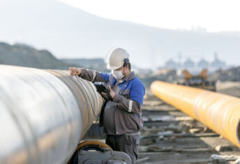 Technician ultrasonic pipeline detection_Getty