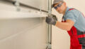 Exclusive: Cortec to launch sale process for A1 Garage Door Service, sources say Installing Residential Garage Doors by Technician_Getty