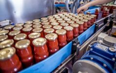 Sauces in bottles at a manufacturing plant.