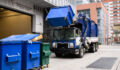 On the Block: Four environmental service providers coming to market shortly, sources say Garbage Truck Lifting Recycling Bin_Getty