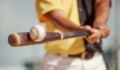 Major League Baseball drawing significant investor interest despite potential lockout Baseball player hitting a baseball with a bat.